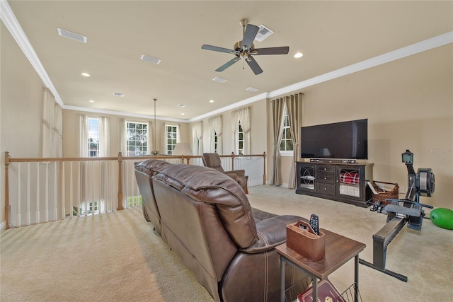 carpeted living room featuring ceiling fan and ornamental molding