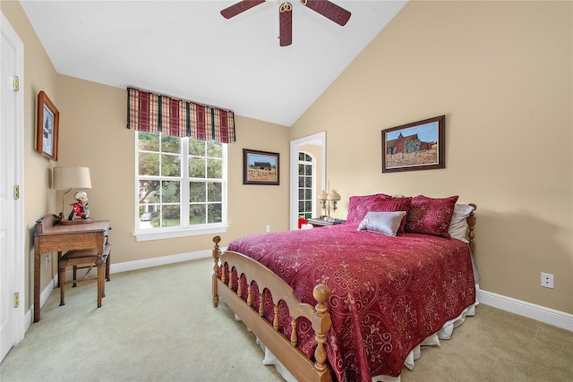 bedroom featuring light colored carpet, high vaulted ceiling, and ceiling fan