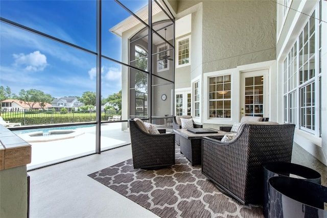 view of patio / terrace featuring an outdoor fire pit, fence, and a fenced in pool