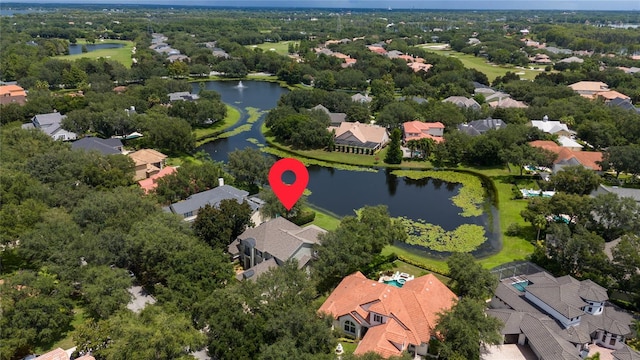 bird's eye view with a residential view and a water view