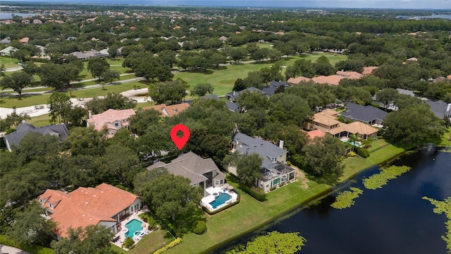 drone / aerial view featuring a residential view and a water view