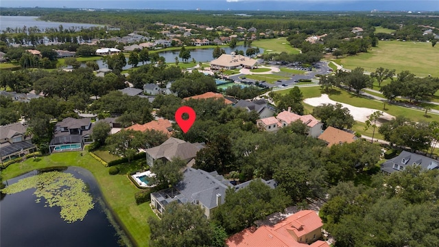 birds eye view of property with a water view and a residential view