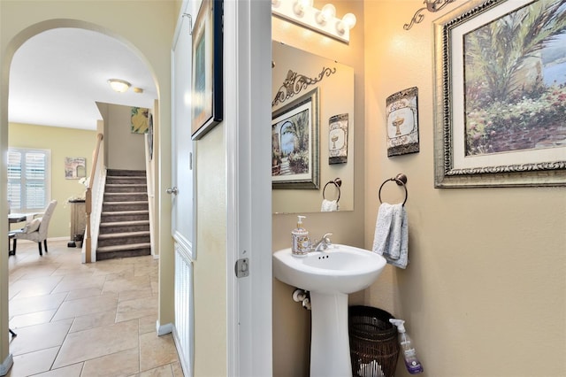 bathroom with tile patterned flooring and sink