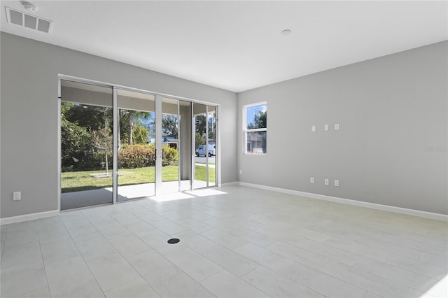 view of tiled spare room