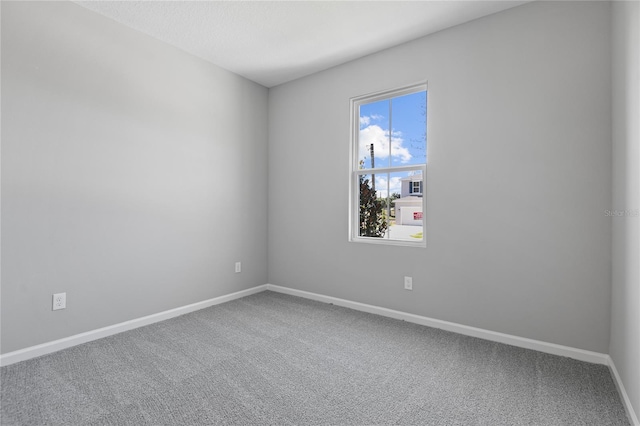 empty room with carpet floors