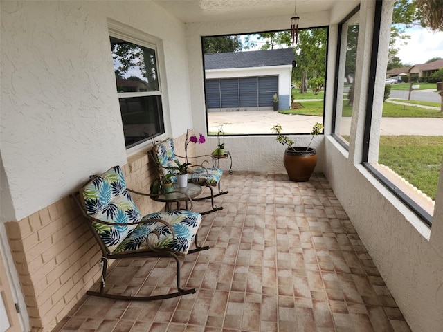 sunroom featuring a wealth of natural light