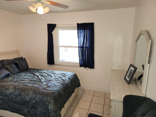 bedroom featuring light tile patterned floors and ceiling fan