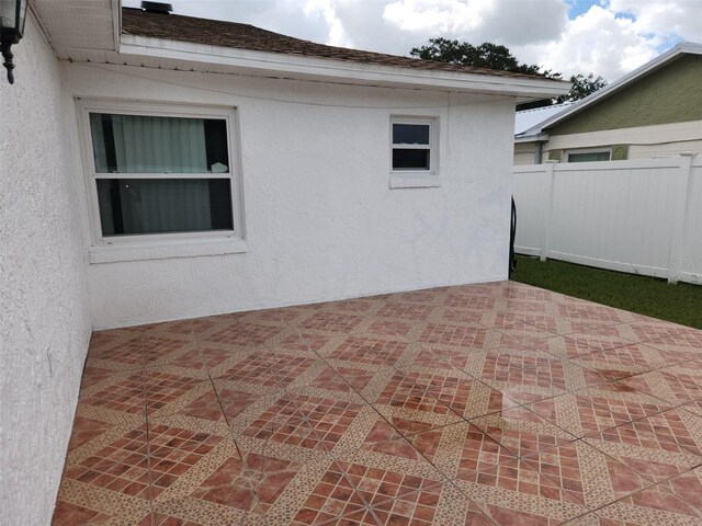 2518 Bowmer Dr, Kissimmee, FL 34744 - view of patio with fence