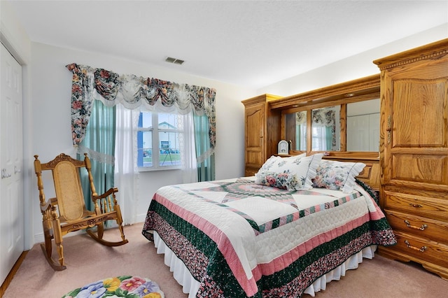 bedroom featuring carpet