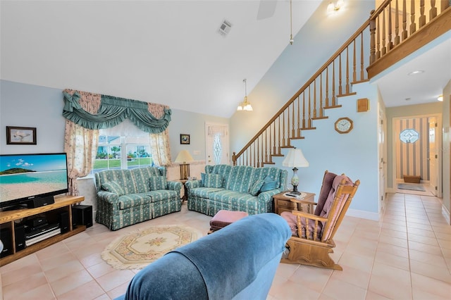 tiled living room with a high ceiling