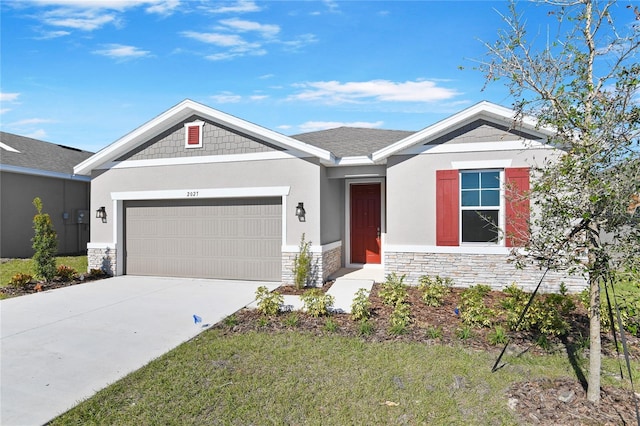 2027 Stetson Ct, Eagle Lake, FL 33839 - view of front of property featuring stone siding, a garage, driveway, a front yard, and stucco siding