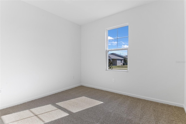 unfurnished room with carpet