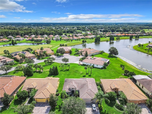 bird's eye view with a water view