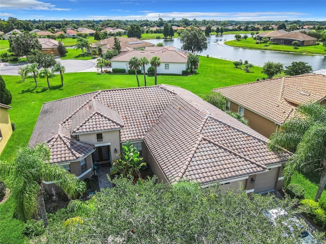 drone / aerial view with a water view