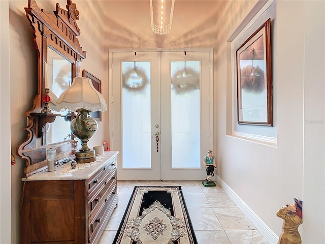 tiled entrance foyer with french doors