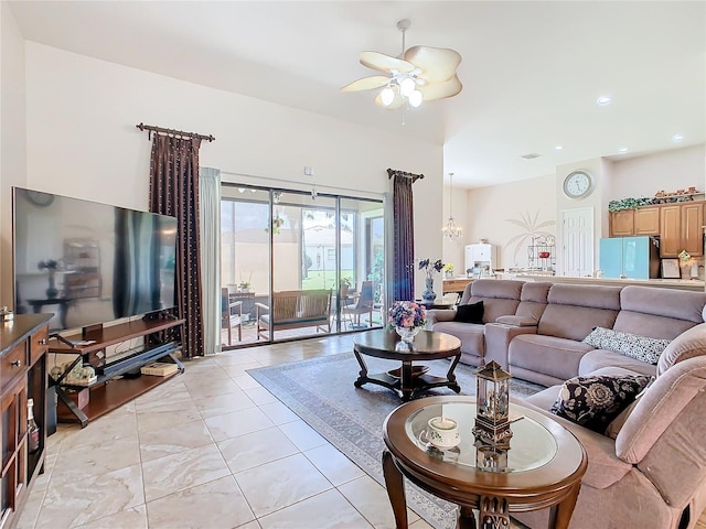 living room featuring ceiling fan and light tile patterned floors