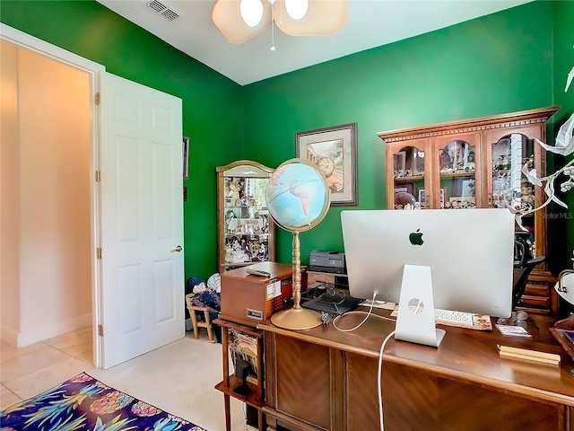 office featuring ceiling fan and light tile patterned floors