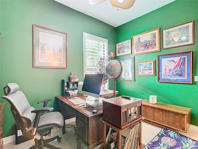 office area featuring light colored carpet and ceiling fan