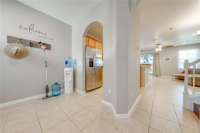 corridor with light tile patterned flooring