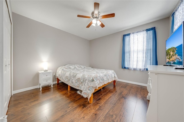 bedroom featuring ceiling fan and hardwood / wood-style flooring