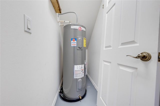 utility room featuring water heater