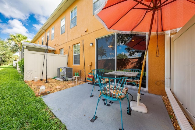 view of patio featuring central AC