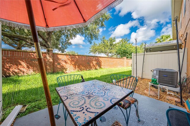 view of patio featuring central AC unit