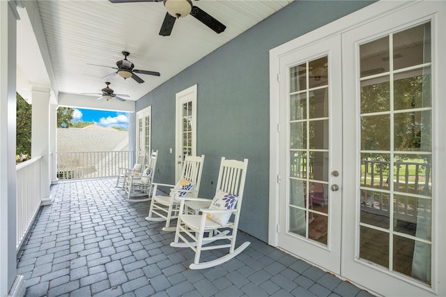 view of patio / terrace with french doors and ceiling fan