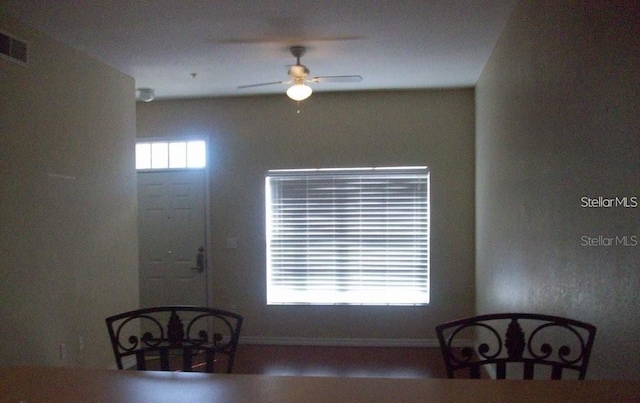 dining space with ceiling fan