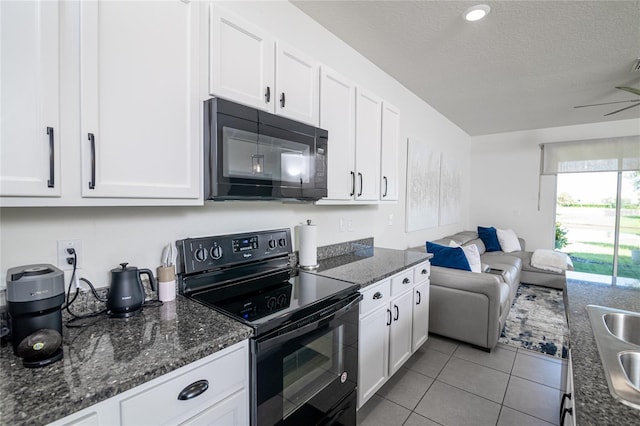 kitchen with white cabinetry, black appliances, and ceiling fan