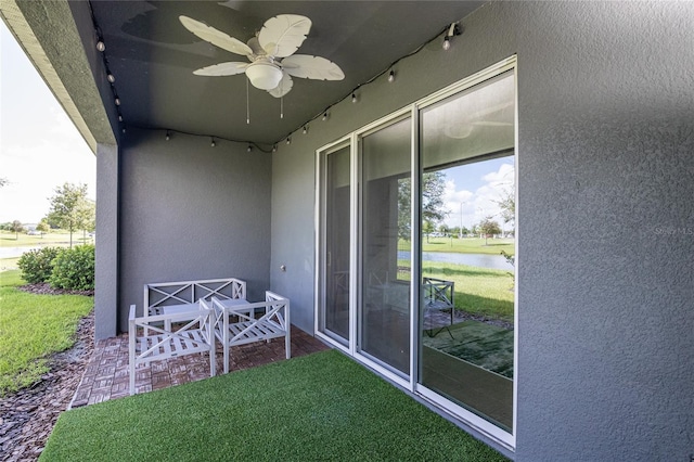 view of patio featuring ceiling fan