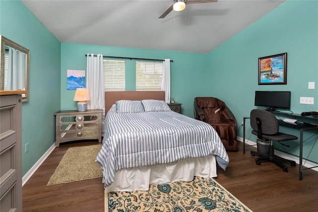 bedroom featuring ceiling fan, vaulted ceiling, and dark hardwood / wood-style flooring