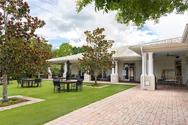 exterior space with a yard and a patio area