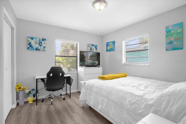 bedroom featuring hardwood / wood-style floors