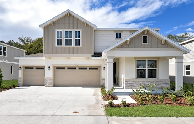 craftsman inspired home with a garage