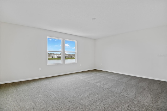 empty room with carpet floors