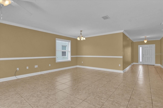 tiled empty room with crown molding and a chandelier