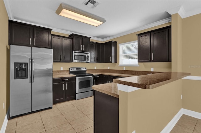 kitchen featuring appliances with stainless steel finishes, crown molding, kitchen peninsula, light tile patterned floors, and dark brown cabinetry