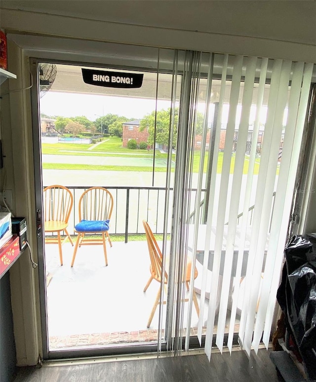 doorway to outside with hardwood / wood-style floors