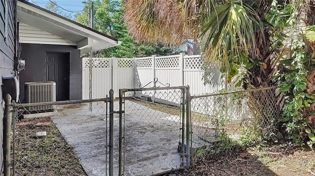 view of gate featuring central AC