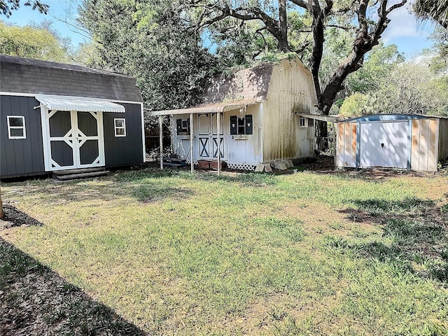 view of yard featuring an outbuilding and a storage shed