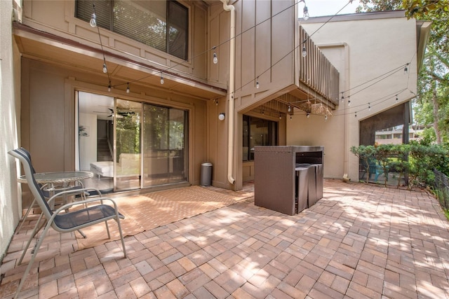 view of patio featuring a balcony