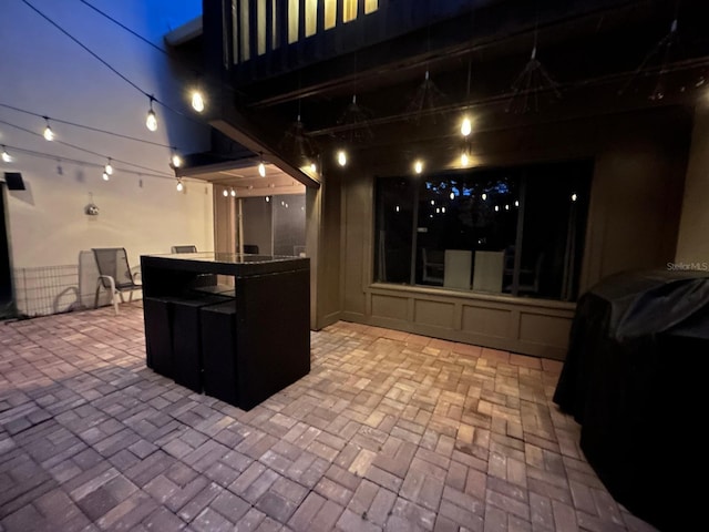 view of patio at night