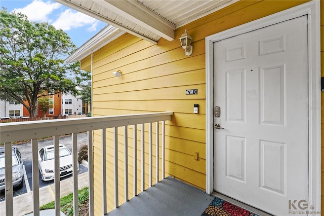 property entrance with a balcony