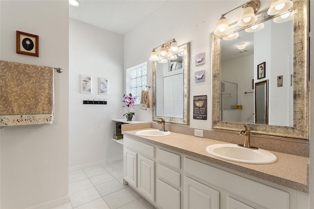 bathroom featuring tile patterned floors and vanity