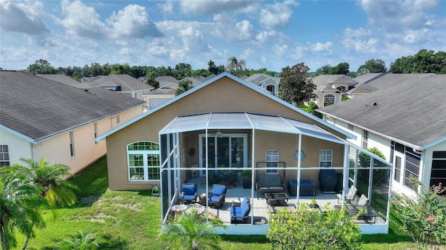 rear view of property with an outdoor hangout area and a patio area