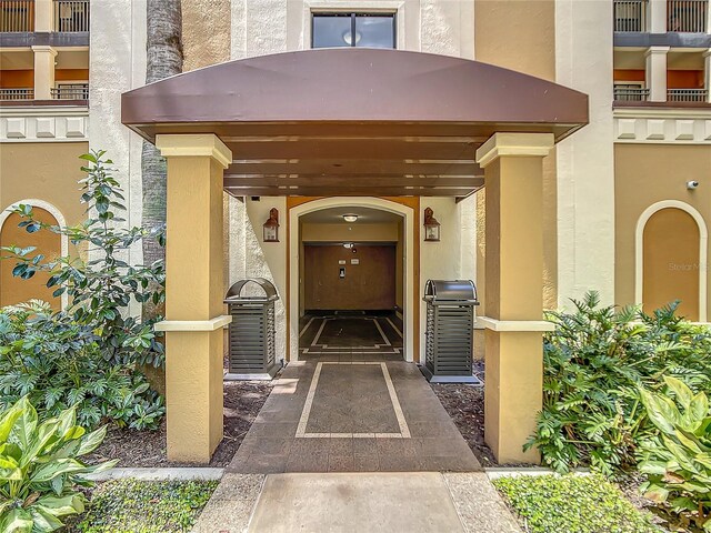 property entrance with a balcony