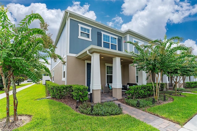 view of front of property featuring a front lawn