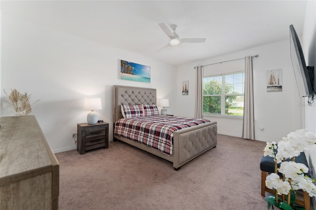 bedroom featuring ceiling fan and carpet flooring