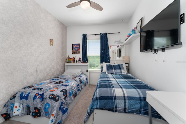 carpeted bedroom featuring ceiling fan